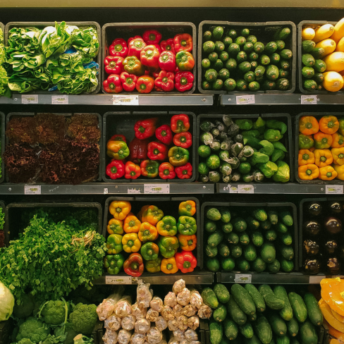 Wall of produce at grocery store